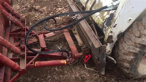 plowing snow with a skid steer|homemade skid steer snow plow.